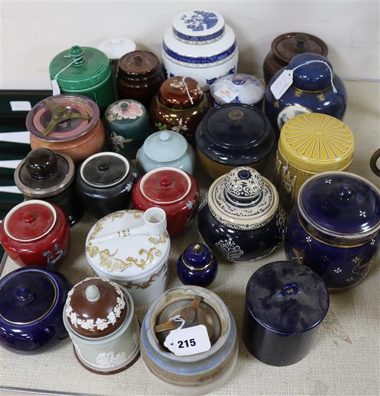 Two Carlton Ware ginger jars, a Royal Doulton Booths ginger jar and twenty three tobacco jars, etc.